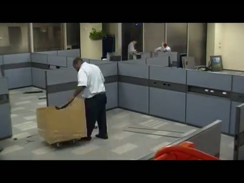 On The Mark Moving crew handling a piece on a San Antonio job